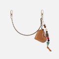 Heart Swells Charm in Buffed Leather – Whiskey