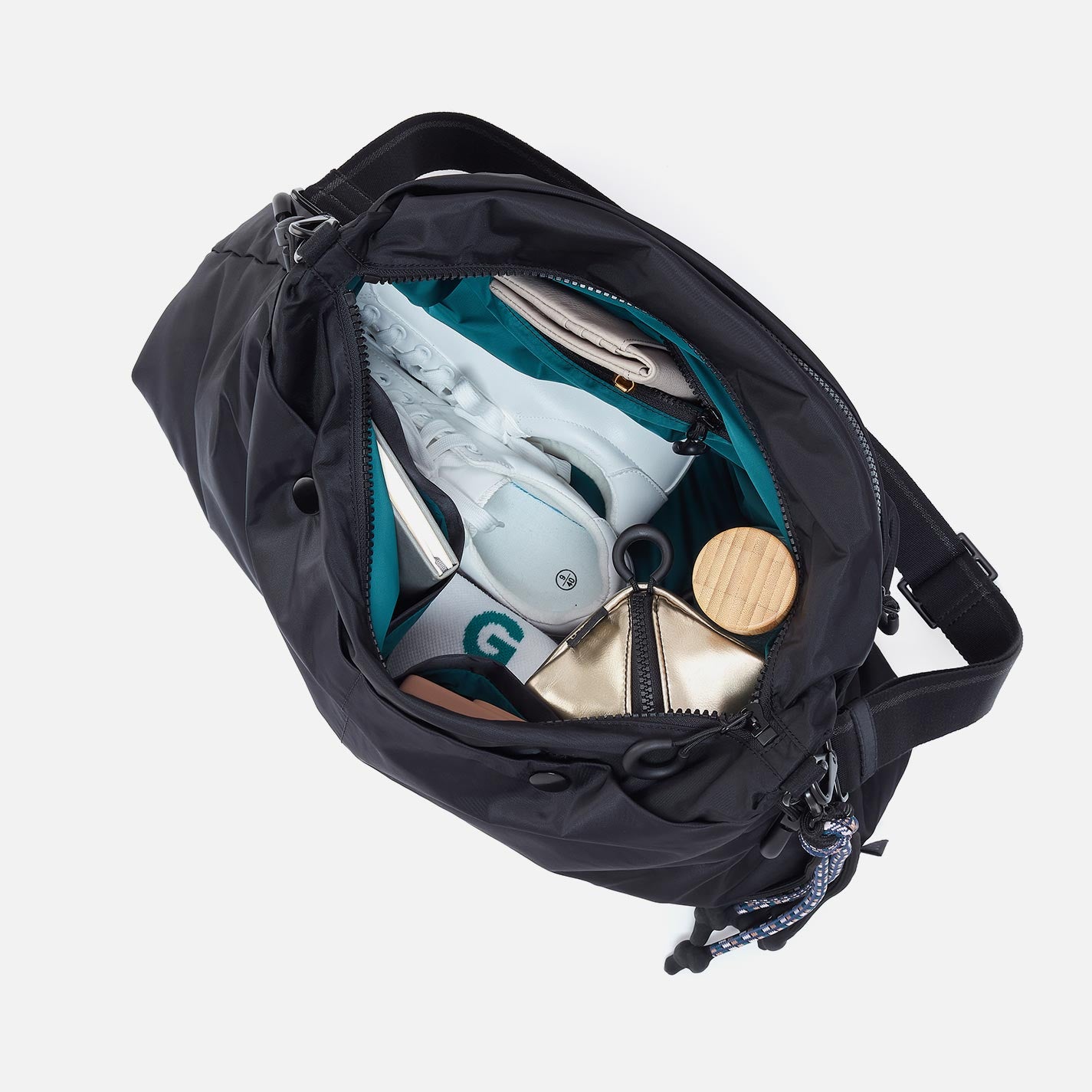 THE BIG DRAW Crossbody in CaRefiber recycled nylon – Jet - HOBO