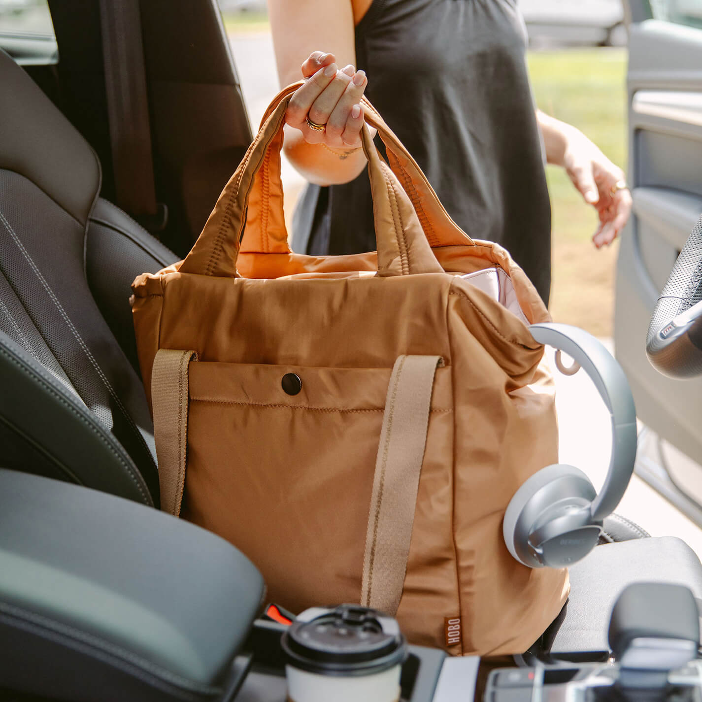 PLACES TO GO Tote in CaRefiber recycled nylon – Dune - HOBO
