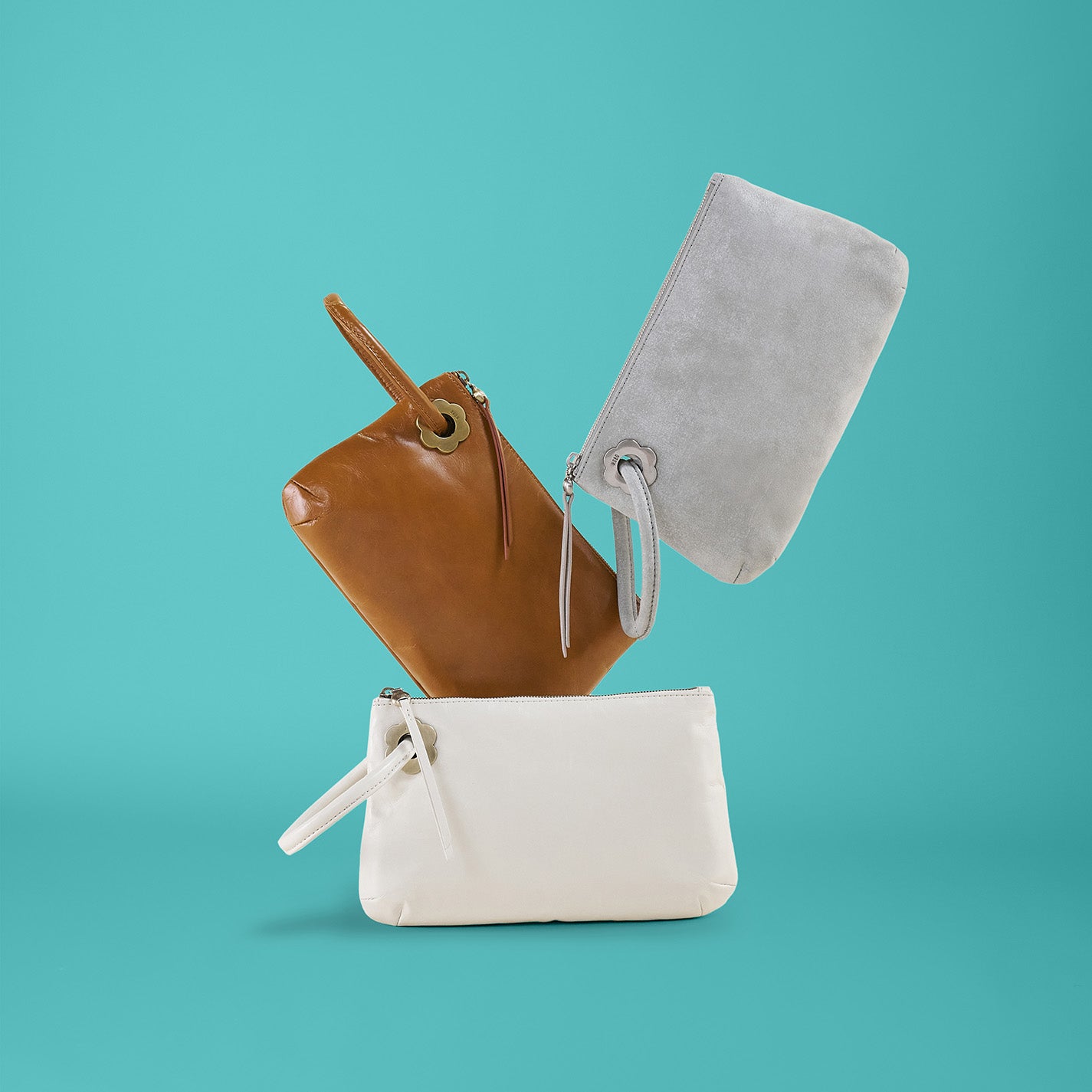 Daisy Daze Large Wristlet In Polished Leather – Truffle - HOBO