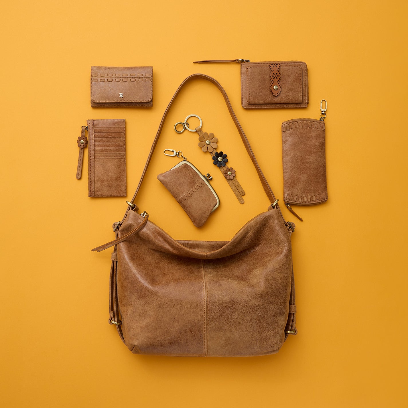 Tabby Zip Medium Wallet In Buffed Leather – Whiskey - HOBO