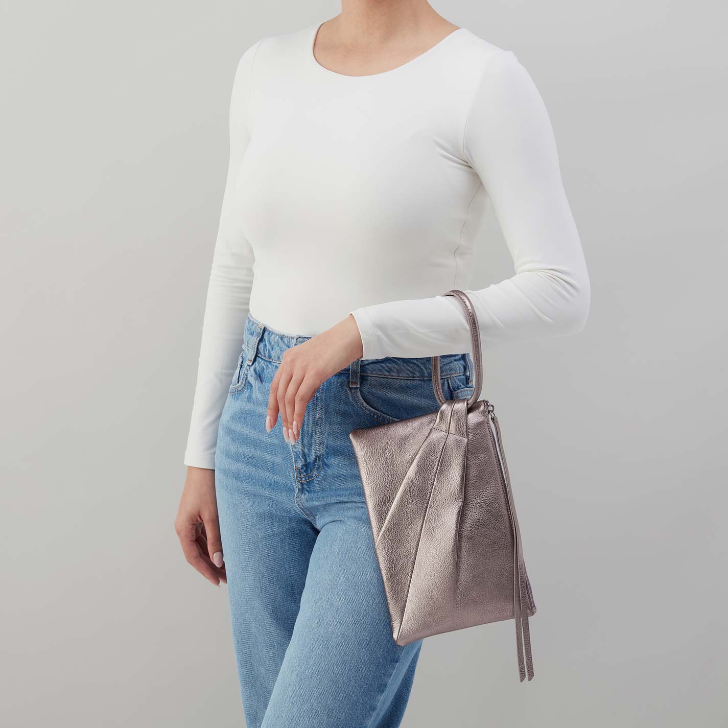 Sheila Soft Ring Clutch in Metallic Leather – Pewter Spur - HOBO