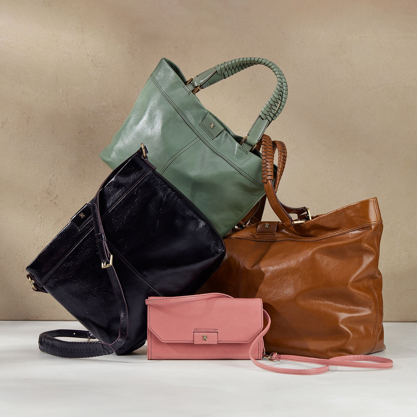 Romy Max Tote In Polished Leather – Truffle - HOBO