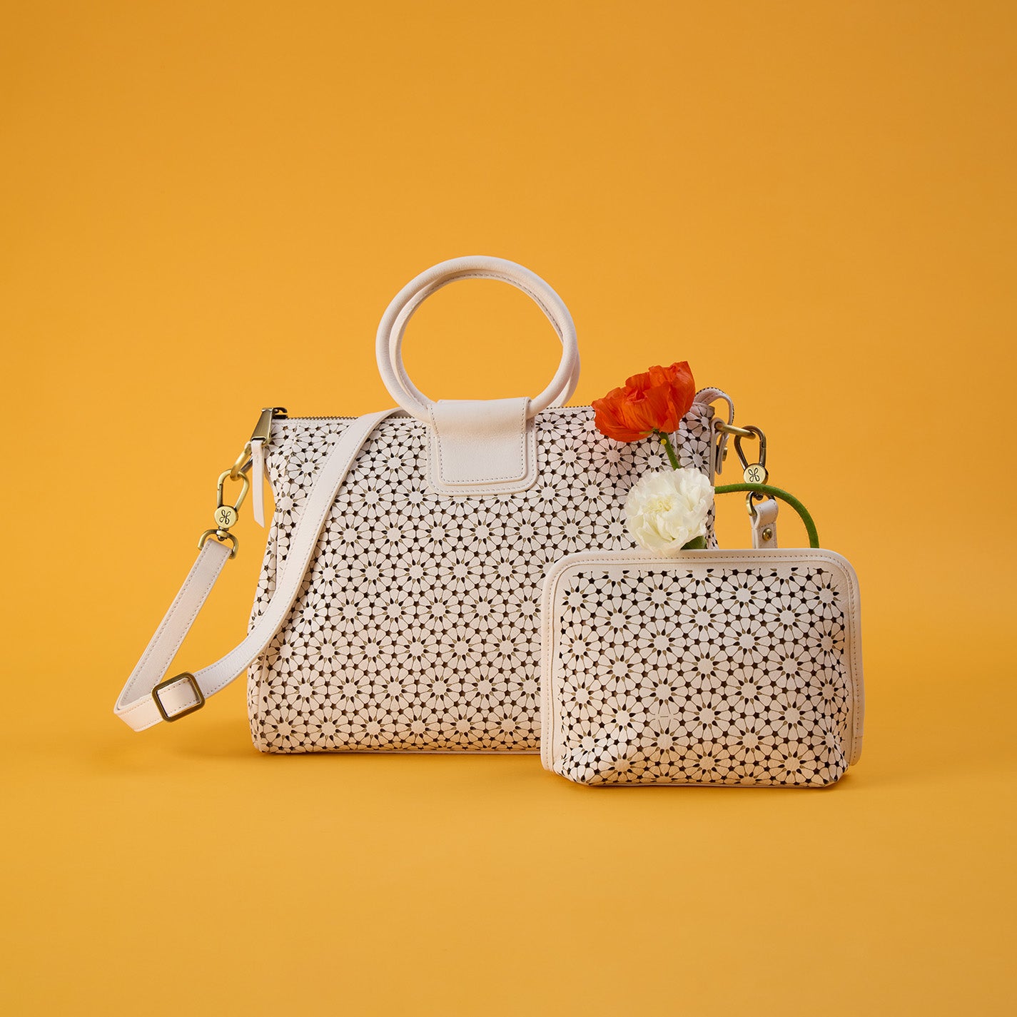 Beauty Cosmetic Pouch In Perforated Leather – Ecru Daisy Perf - HOBO
