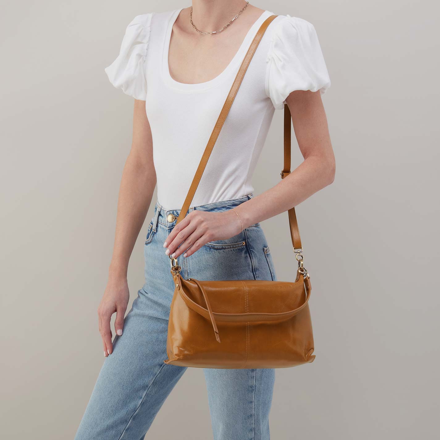 Avon Shoulder Bag in Polished Leather – Truffle - HOBO