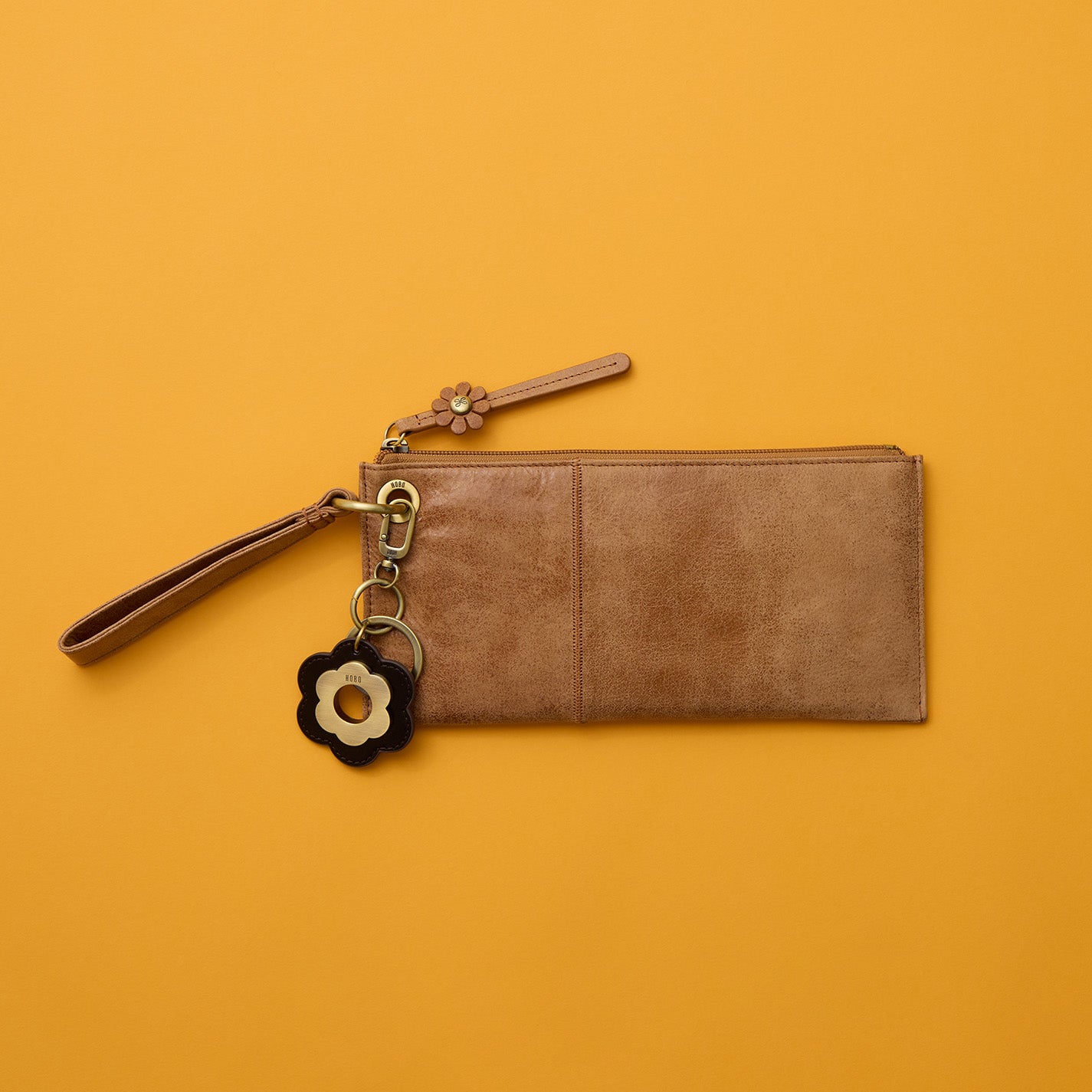 Daisy Keychain In Polished Leather – Black - HOBO